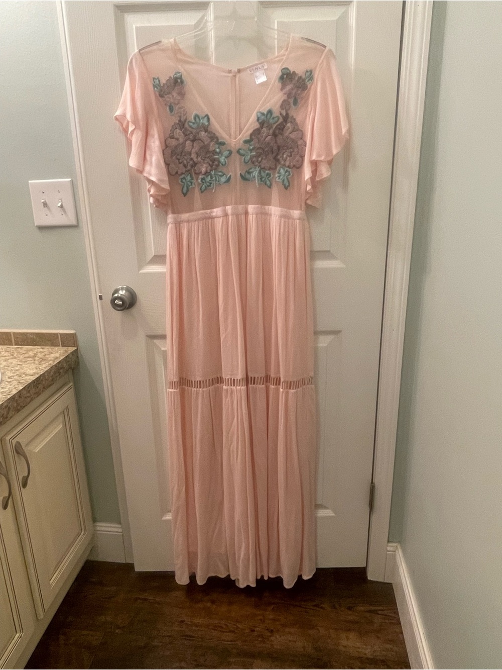 VENUS Light Blush Pink Clothing Label Close-Up